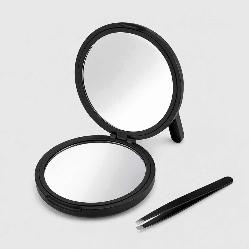 Miroir grossissant de poche noir de 8,9 cm sur fond gris clair